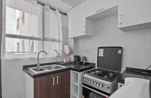 Nairobi Apartment | Live like a local with top restaurants, parks, stores, bars, and malls just steps away