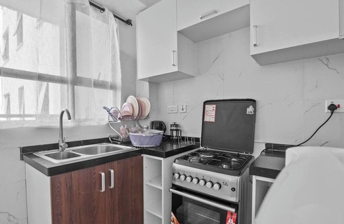 Nairobi Apartment | Live like a local with top restaurants, parks, stores, bars, and malls just steps away