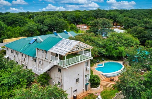 Victoria Falls House | Zambezi Boutique Lodge, 2 Suites ask for our free Savannah Adventures 4x4 Safari