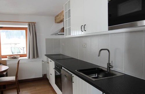 Bichlbach Apartment | This spacious vacation home is perfect for large families, groups of friends