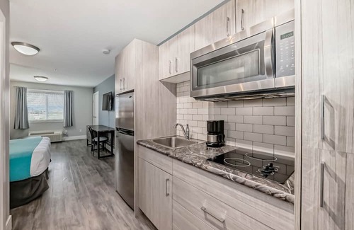 Red Deer Apartment | The Suites by INN Hotels