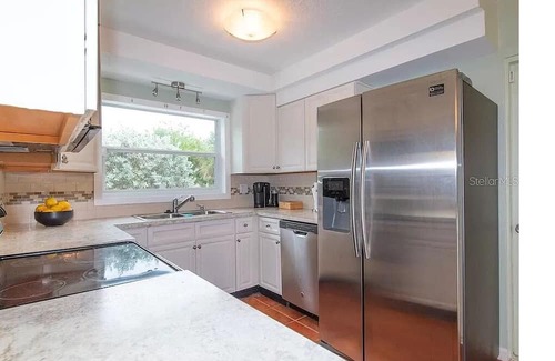 Indian Beach Sapphire Shores House | Walk 2 blocks to the bay, treed neighborhood and use the Kayaks -Sapphire Shores
