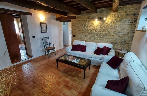 Penna San Giovanni House | San Isidore, a meticulously restored historic Italian home with a stunning pool.