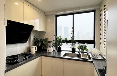Huaihai Road Commercial Area Apartment | peaceful urban retreat in a stylish minimal apartment with views across the city