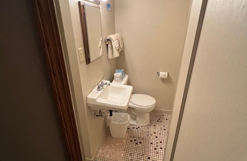 Onalaska House | Overlooking Lake Onalaska -- full-size bed + bath in nostalgic motel