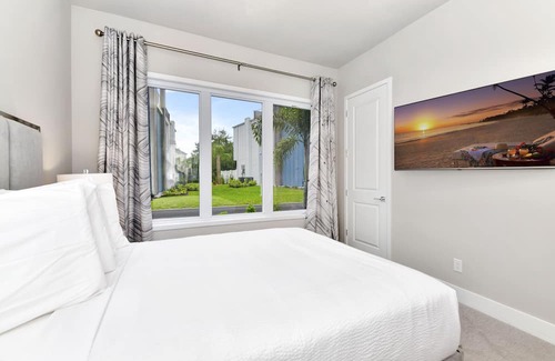 Galilee House | Modern Condo with Large Outdoor Patio. Reunion Resort Water Park Access near Disney at Spectrum Resort Orlando by Rentyl – B16 #137