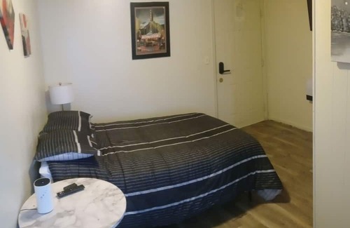 Savage House | Affordable cozy room meets unbeatable convenience.