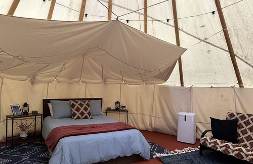 Steelville RV Rental | A teepee on 1200-acre ranch where secluded woods envelope the grounds.