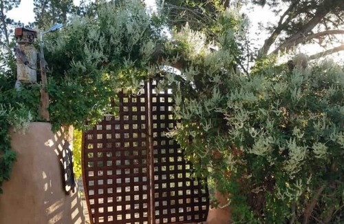 Cerrillos House | Romantic, Rock Carriage House, Hot Tub, WoodStove, on Historic Property