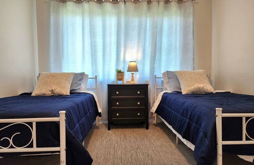 La Mirada House | Sunlit Sanctuary: 4BR for Families & Pets
