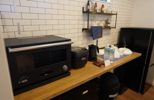 Saeki Ward House | Limited time offer today Sameday discount price - Garage House Hotel ISHIUCHI BASE 02 / Hiroshima Hiroshima