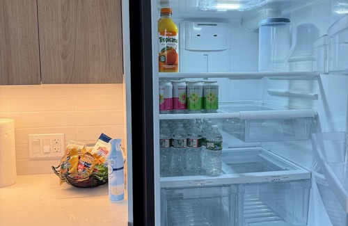 East Boston Apartment | Luxury 1BR w/Rooftop 5 min to Logan Airport Free EV Garage Parking