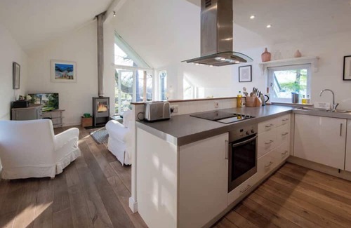 Loch Tay House | Luxury waterfall cottage with private hot tub at Loch Tay