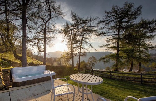 Loch Tay House | Luxury waterfall cottage with private hot tub at Loch Tay