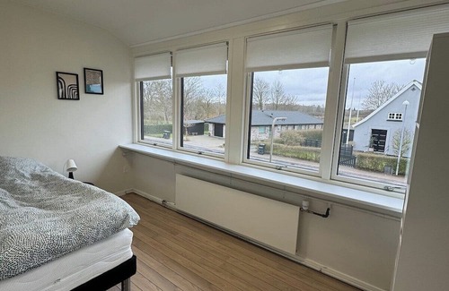 Odense Apartment | Elegant Odense Retreat – Rooftop Views & Room for 7