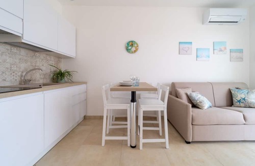 Pachino Apartment | Charming 40 sqm apartment with sea view, able to accommodate 4 people, located inside the renowned Borgo84 residence, equipped with swimming pool and cycle path. The property is located just 3 km from the center of Marzamemi, one of the most fascinating