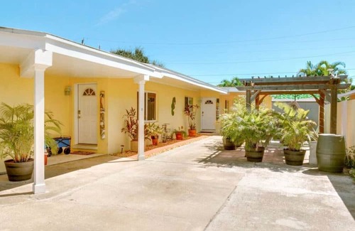 Cocoa Beach House | Fiesta Flamingo Cottage: Your Cocoa Beach Paradise with Kayaks & Bikes