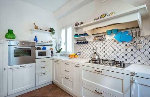 Marsala House | My Rental Homes - Casa Tika with shared pool surrounded by a wonderful garden