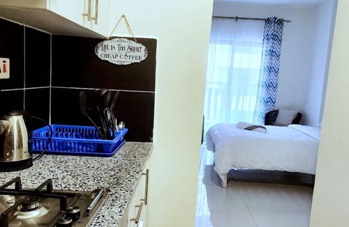 Nairobi Apartment | Cozy Studio With Balcony Near JKIA, SGR and National Park