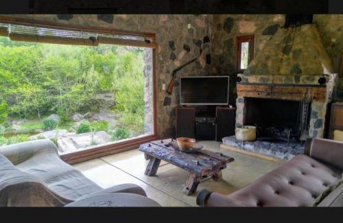 Falda del Carmen Villa | Casa de Piedra