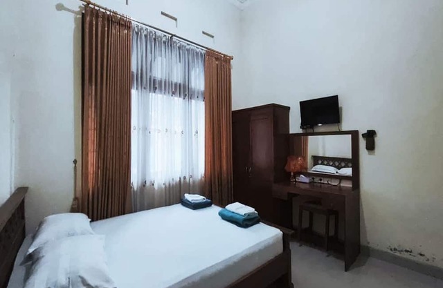 OYO 94673 Guesthouse Syariah