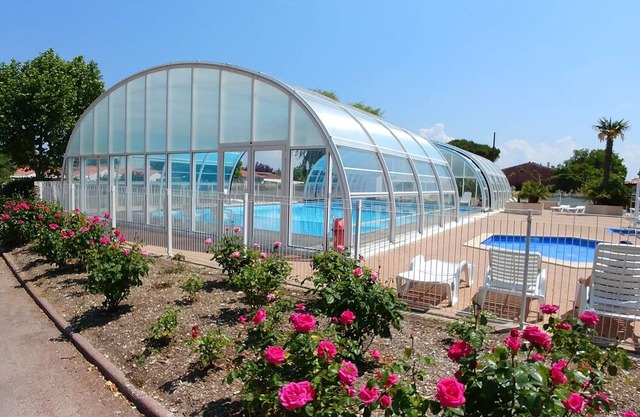 Holiday home on the island of Oléron in a residential park with heated swimming