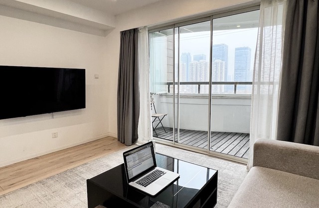peaceful urban retreat in a stylish minimal apartment with views across the city