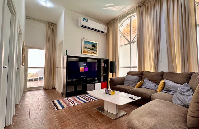 Heart of Doha Elegant Home with Shared Swimming Pool