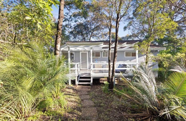 A classic beach house with waterfront access and a 5min walk to the beach