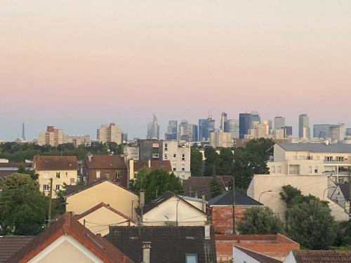 Duplex familial vue Tour Eiffel