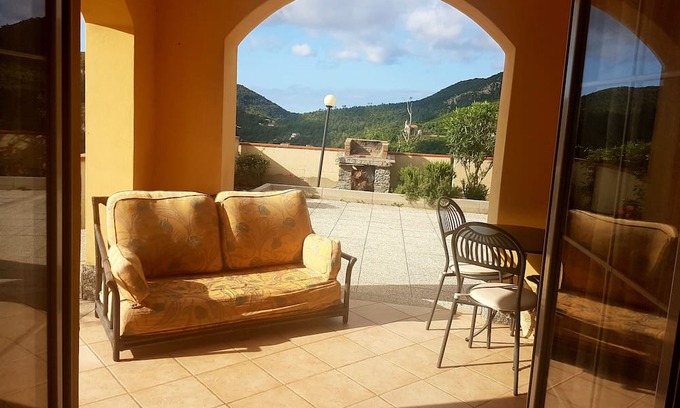 Vezzi Portio House | Holiday Home 'Villetta Natura' with Shared Pool, Private Terrace and Wi-Fi