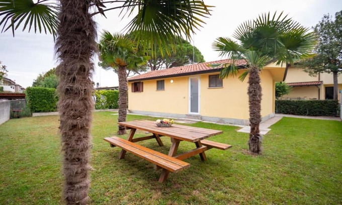 Lignano Sabbiadoro Villa | Cozy and welcoming single house with private garden by Beahost Rentals