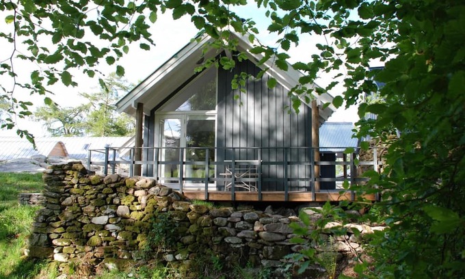 Loch Tay House | Luxury waterfall cottage with private hot tub at Loch Tay