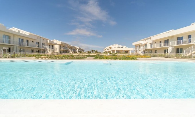 Pachino Apartment | Charming 40 sqm apartment with sea view, able to accommodate 4 people, located inside the renowned Borgo84 residence, equipped with swimming pool and cycle path. The property is located just 3 km from the center of Marzamemi, one of the most fascinating